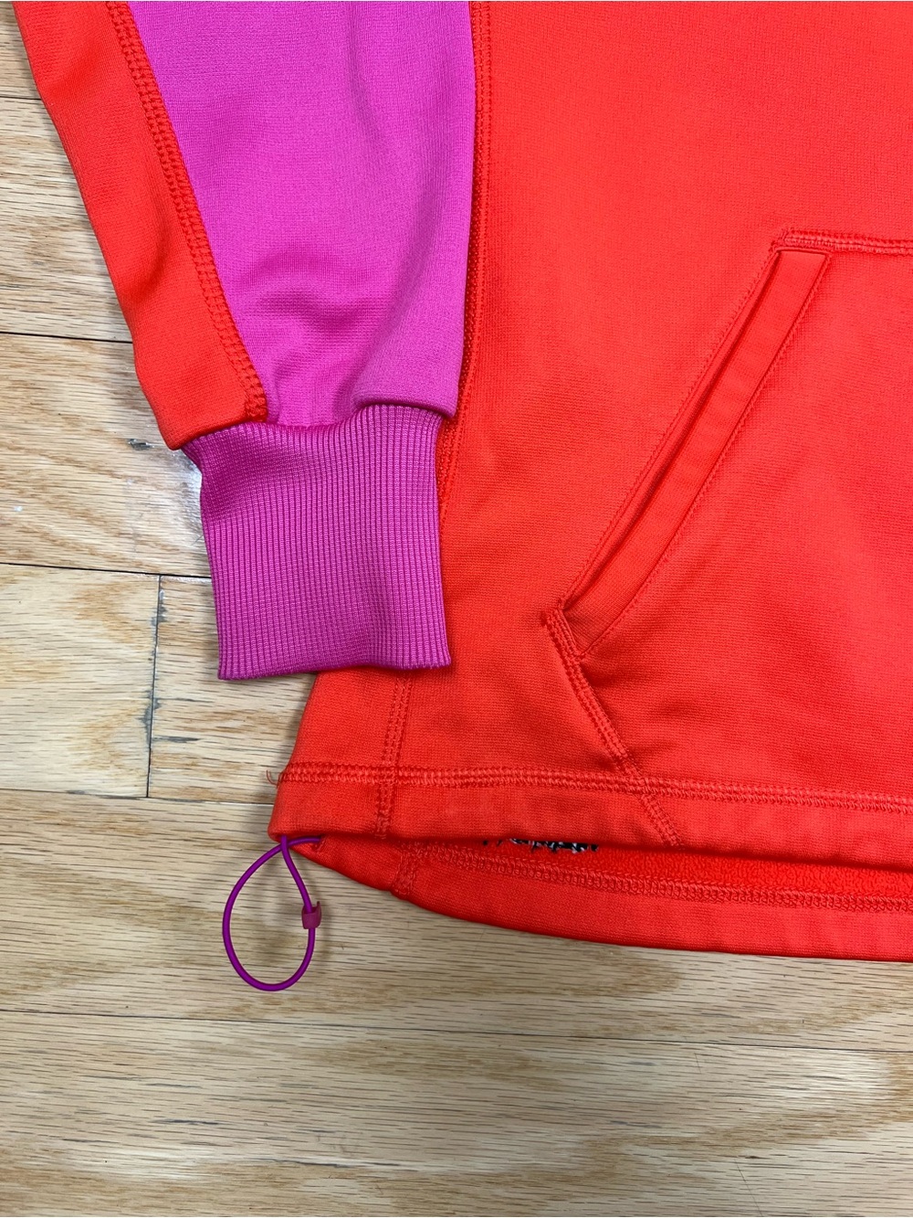 Nike Women’s Therma-FIT Colorblock Pullover Hoodie in Bright Orange & Purple - Picture 2 of 11